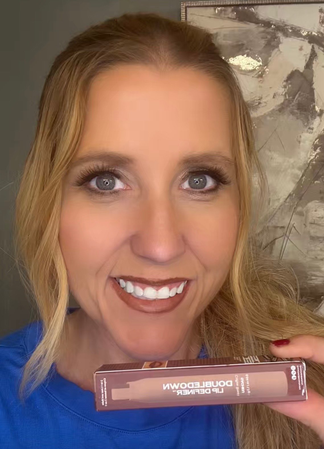 Woman with lip balm